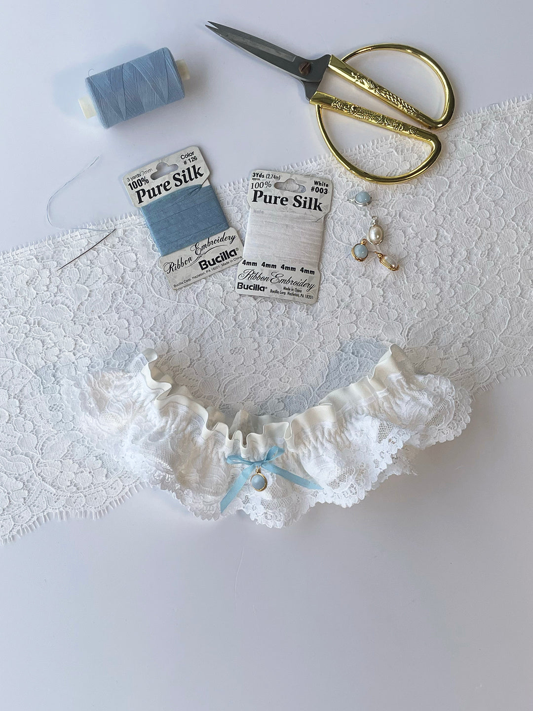 Handmade ivory silk and lace wedding garter by Ayten Gasson - luxury bridal lingerie made in UK