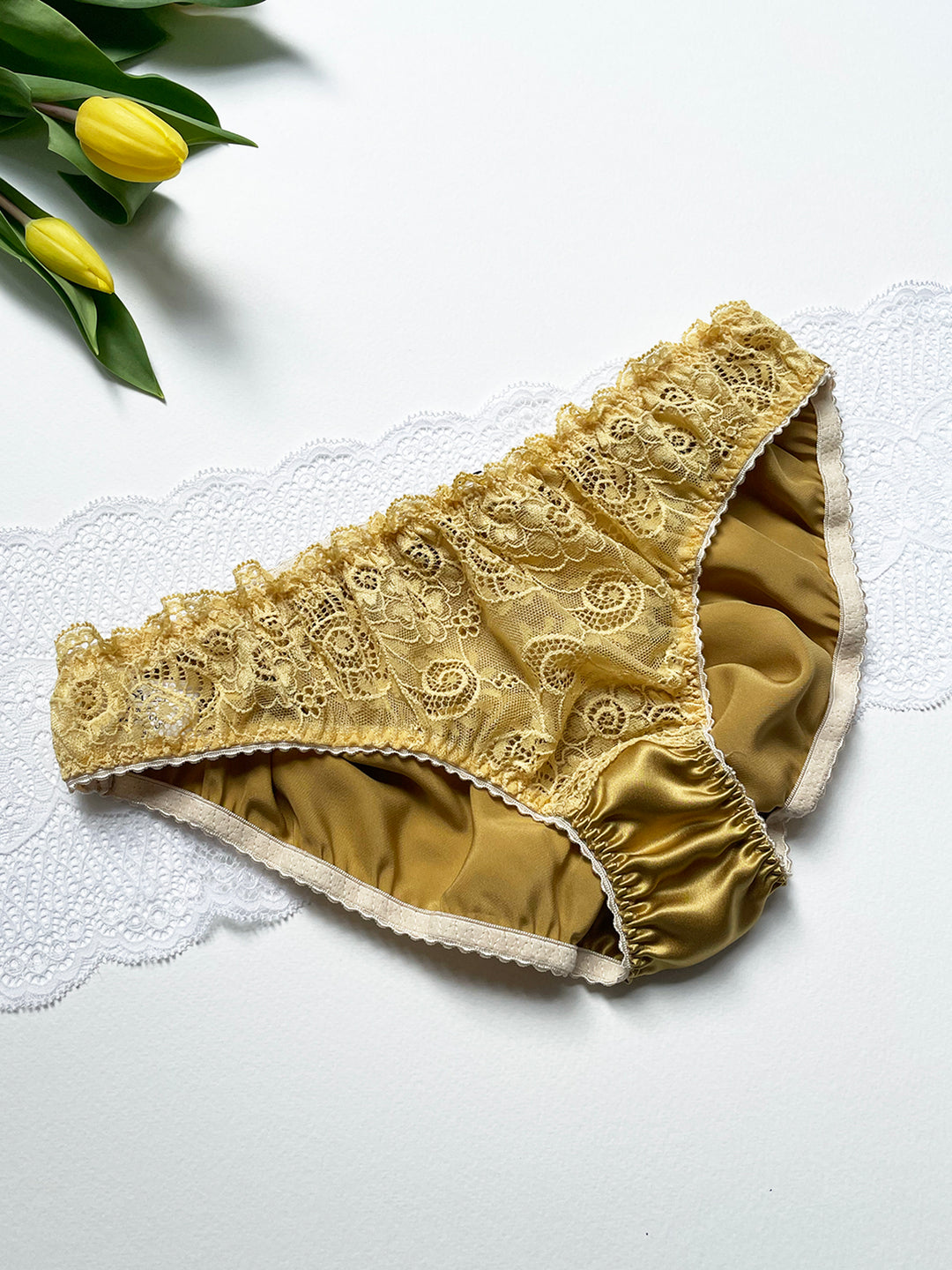 Aurelia gold silk knicker lifestyle image - luxury handmade lingerie made in Brighton