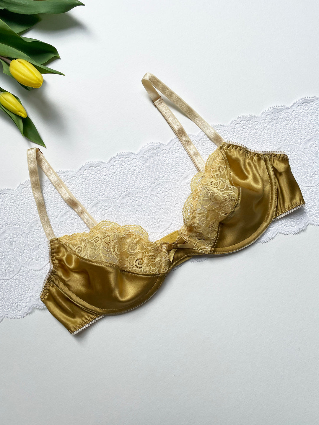 Aurelia gold silk plunge bra lifestyle - luxury handmade lingerie made in Brighton UK