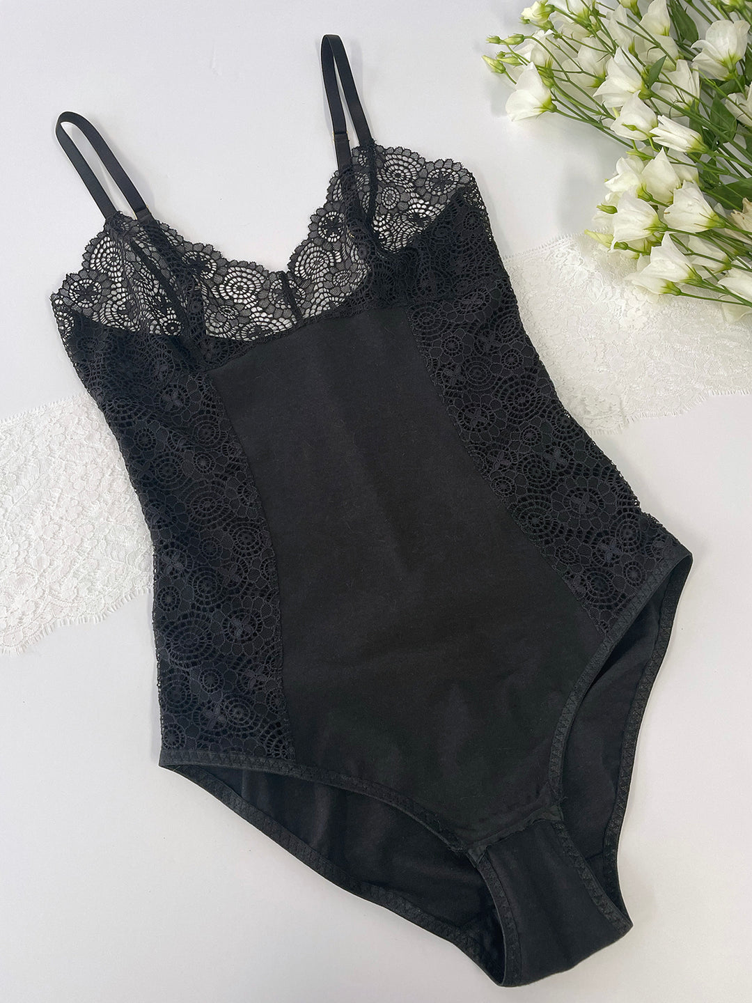 Ava organic bamboo bodysuit lifestyle with lace side panels - sustainable handmade luxury lingerie