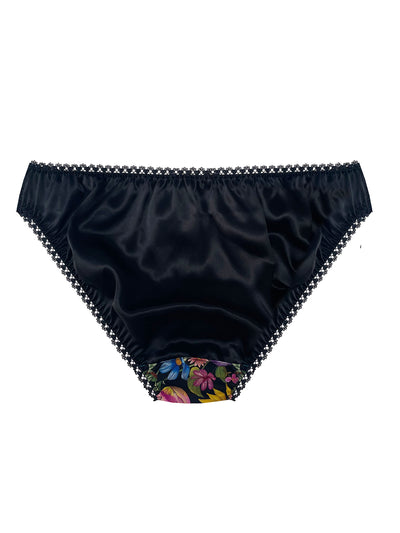 Floral Muse Liberty Silk Knicker. Black satin underwear with a floral pattern on a white background