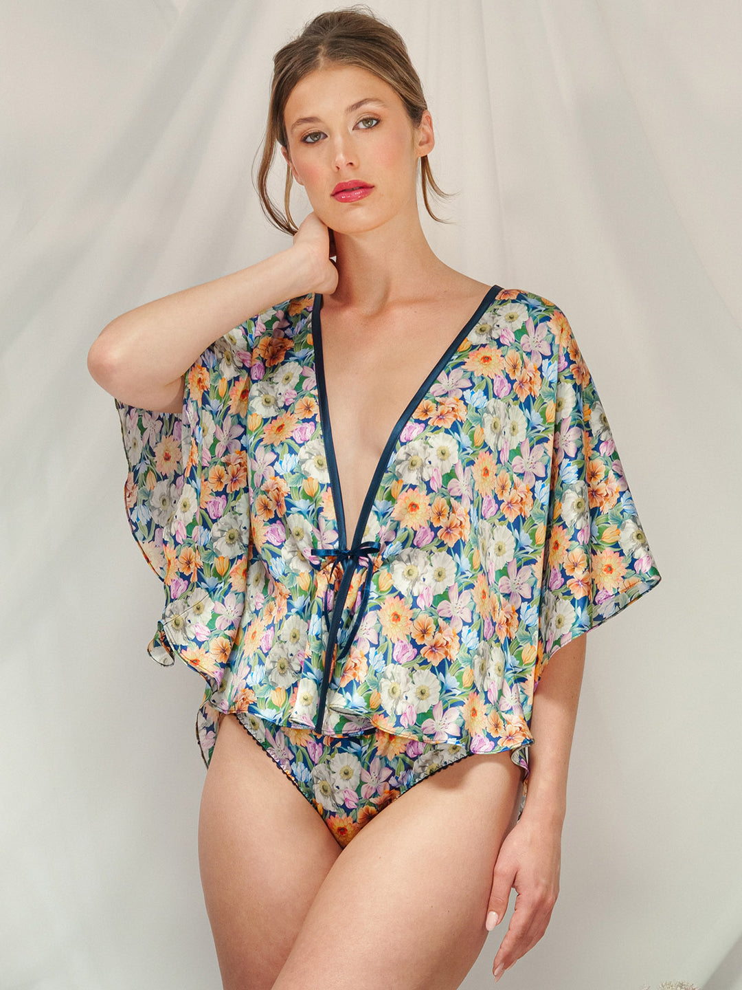 Melody Bloom navy Liberty silk bed jacket lifestyle - handmade luxury nightwear by Ayten Gasson