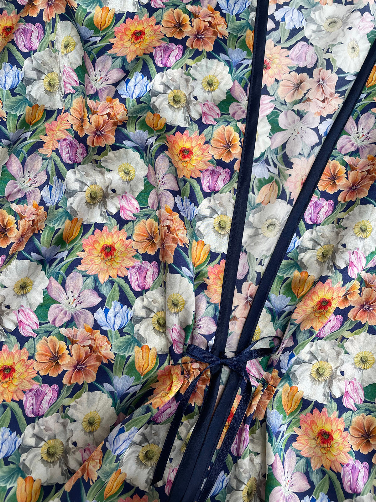 Melody Bloom Liberty London fabric with a close-up of a bow