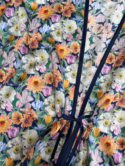 Melody Bloom Liberty London fabric with a close-up of a bow