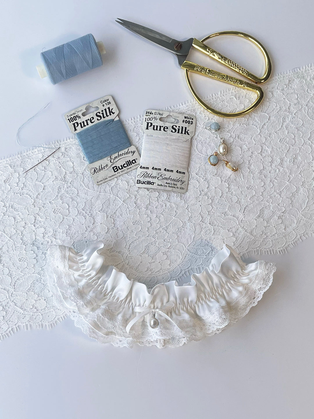 Clara white silk and lace wedding garter with detachable pearl pendant - handmade luxury bridal accessory