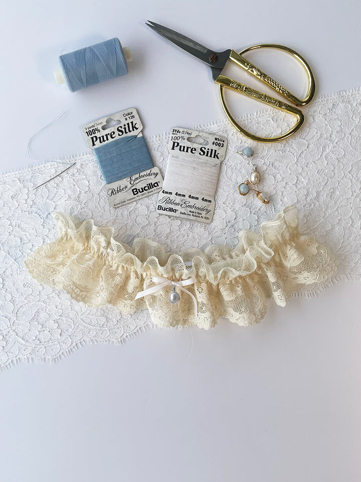 Harper cream lace garter with white bow - handmade bridal lingerie with pearl pendant charm