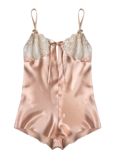 Peach silk teddy with Oeko-Tex certified lace cups, adjustable straps, and French knicker-style cut