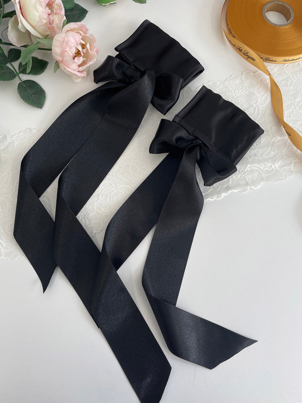Luxury black silk cuffs lifestyle image - handmade sensual accessories in premium silk