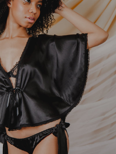 Elegant black silk bed jacket with Cluny Lace trim and satin ribbon ties